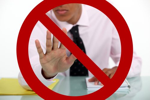 businessman-making-a-stop-gesture